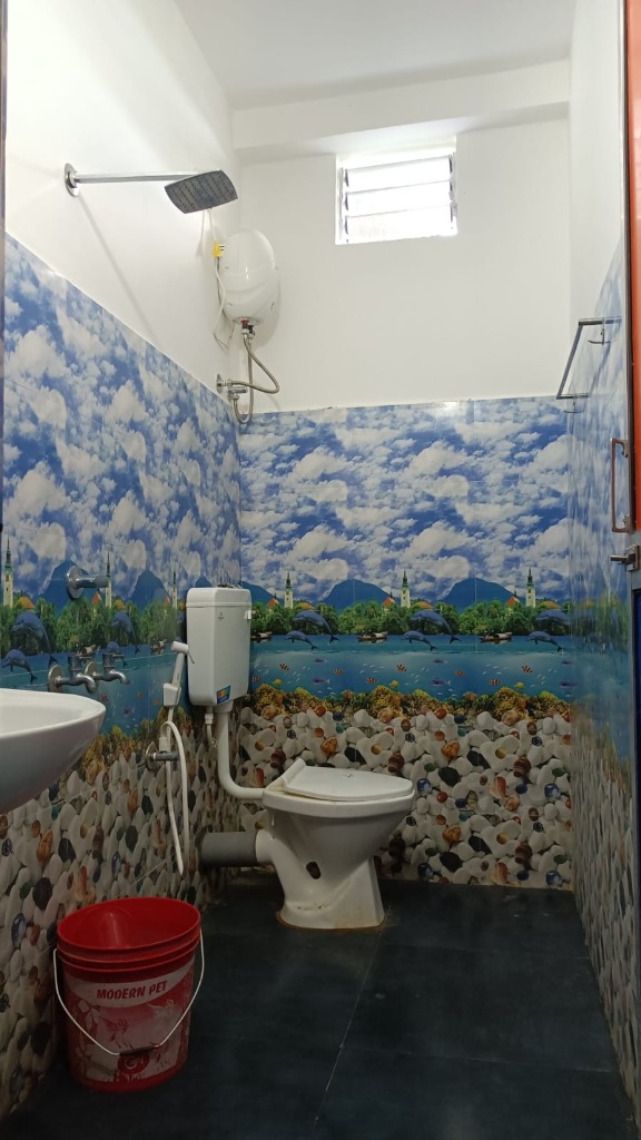 Clean Attached Western Bathroom with Geyser and Shower